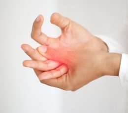 rheumatoid arthritis and repetitive motion injuries,including carpal tunnel syndrome in woman and she touching on her wrist and symptoms of pain and swelling in the hand use for health care concept.